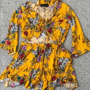 Yellow floral peep hole romper